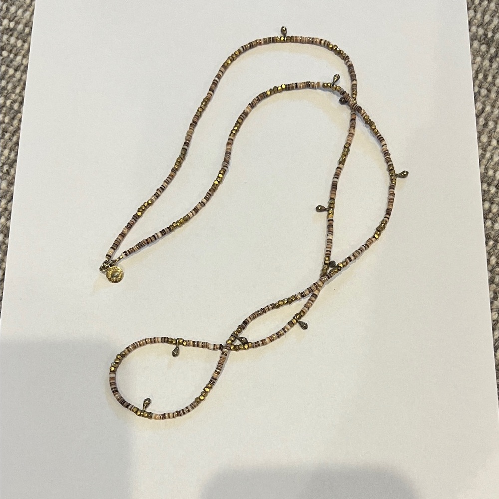Catherine Weitzman necklace.  Brass detail with beads 32” long